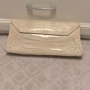 Nancy Gonzalez genuine crocodile clutch.